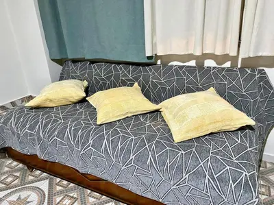 a bed with two pillows on top of it at Apartment in Athens near Acropolis in Athens