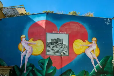a mural of mermaids on a wall with a heart at Entire Building in the Heart of Athens Sleeps 15 with Private Rooftop Terrace in Athens