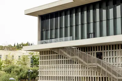 a staircase leading up to a building at Spacious High-Ceiling 2-Bedroom by Acropolis Museum in Athens