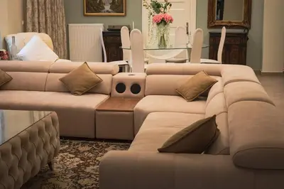 a living room with two couches and a table at Λabirinthia in Athens