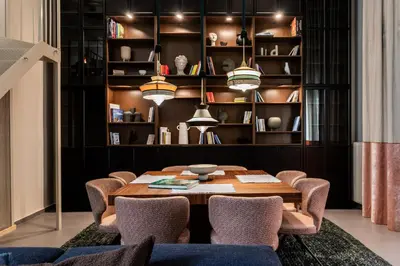 a dining room with a table and chairs at The Gate by Zoia Living in Athens