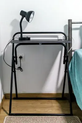 a desk with a lamp on top of it at Dimosthenis_Loft1 in Athens