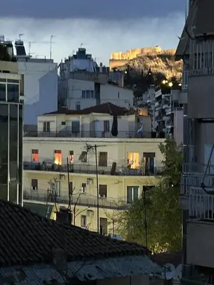 a view of a city with buildings at Like Home Acropolis 50 in Athens