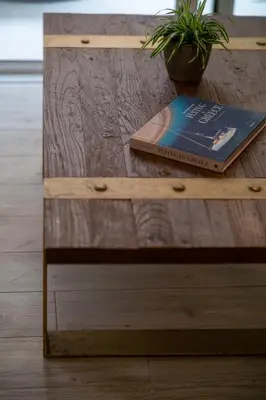 a book sitting on top of a wooden table at 1BR Athenian Serenity 15 Minutes From Acropolis in Athens