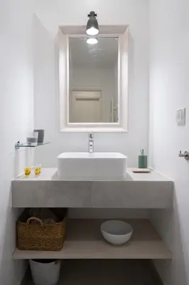 a bathroom with a sink and a mirror at 1BR Athenian Serenity 15 Minutes From Acropolis in Athens
