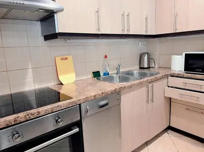 a kitchen with a sink and a counter top at 2BR Apartment next to National Archaeological Museum and AUEB in Athens