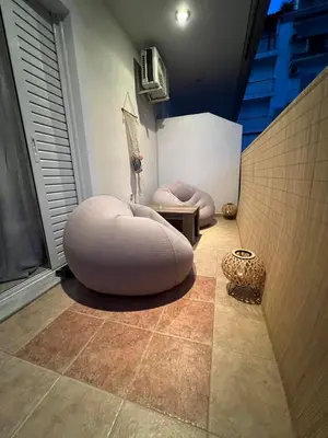 a room with two bean bags on the floor at Cozy Apartment In The Heart Of Athens in Athens