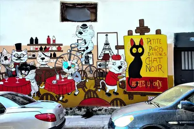 a mural of cats on the side of a building at Dimosthenis_loft2 in Athens