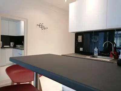 a kitchen with a counter top and a sink at Syntagma Nest Apartment in Athens