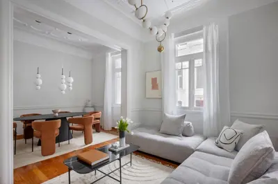 a living room with a couch and a table at Acropolis Villa 3BR 9ppl 10 minutes Metro&Museum in Athens