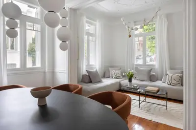 a white living room with a table and chairs at Acropolis Villa 3BR 9ppl 10 minutes Metro&Museum in Athens