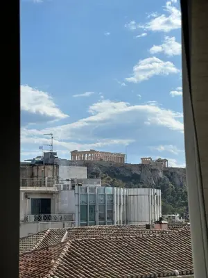 a view from the roof of a building at 2 BD Apt in Syntagma with Acropolis view in Athens
