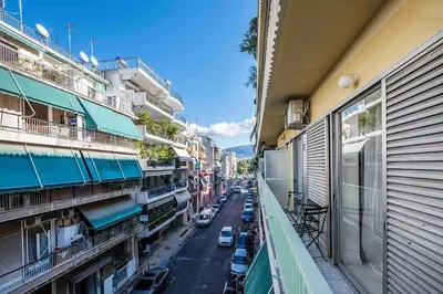 a view of a street from a balcony of a building at James - 2BR in the Heart of Ancient Athens in Athens