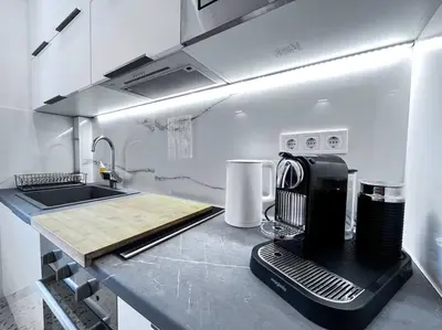 a kitchen with a mixer on a counter top at James - 2BR in the Heart of Ancient Athens in Athens