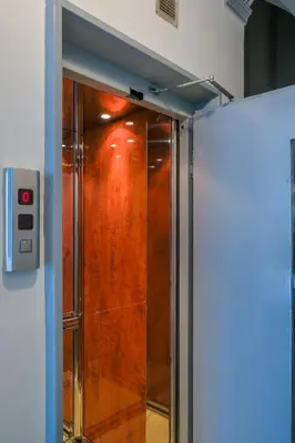 a shower with a glass door in a room at SOKOS Residence, 3' walk from Neos Kosmos Metro in Athens