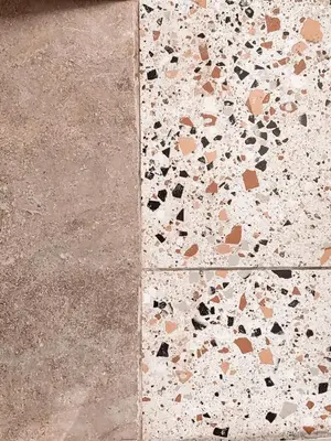 a close up of a concrete floor with hearts on it at Bohemian Apartment in Central Athens in Athens