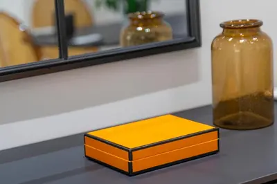 a yellow box sitting on a counter next to a mirror at The Urban Nest Design 1BR in Trendy Kerameikos in Athens