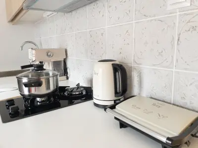 a coffee maker on a stove in a kitchen at NobleNotes - Victor Suite Central Athens in Athens