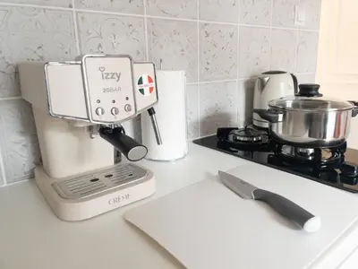 a kitchen counter with a coffee maker and a mixer at NobleNotes - Victor Suite Central Athens in Athens