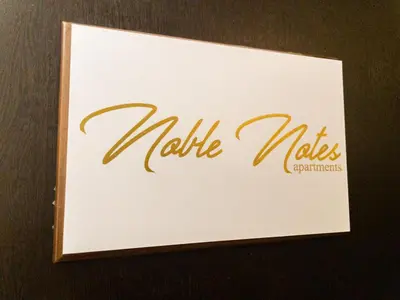 a sign with the name of make notes on it at NobleNotes - Victor Suite Central Athens in Athens