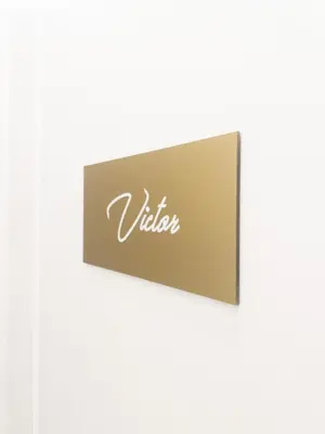 a sign with the word visitor on a wall at NobleNotes - Victor Suite Central Athens in Athens