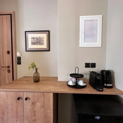 a wooden counter top in a room at Potnia Athens in Athens