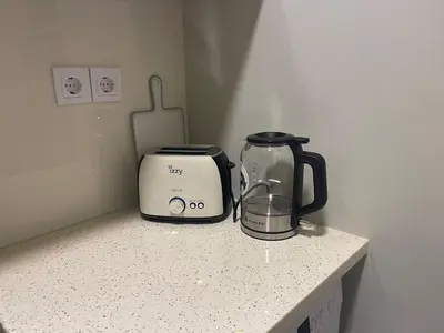 a blender and a toaster sitting on a counter at Apartment 55 Fix in Athens
