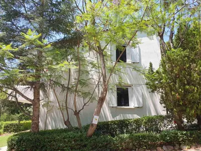 a white house with trees in front of it at Sea Satin Anavyssos in Anavissos