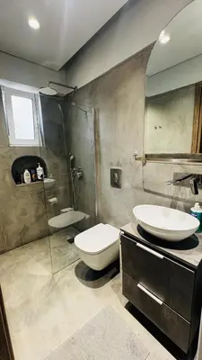 a bathroom with a toilet and a sink and a shower at Urban escape in Athens in Athens