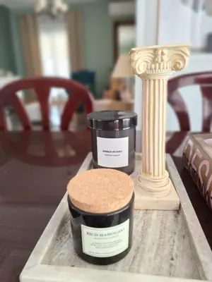 a table with two candles and a column on it at Large 1 bedroom Penthouse with Large Terrace in Athens