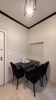 a dining room with a table and two chairs at The NOTARY in Athens