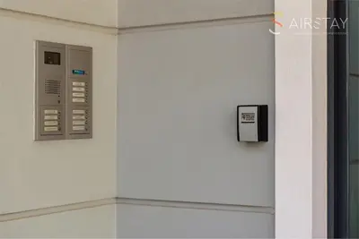 a wall with an electrical box on a wall at Akali Apartment airport by Airstay in Spáta