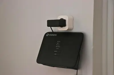 a phone is plugged into a outlet on a wall at Athens Marialena Apartment in Athens