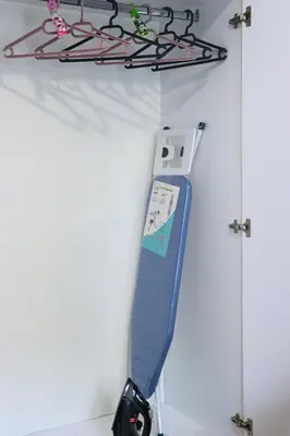 a cell phone is hanging on a wall at Athens Marialena Apartment in Athens