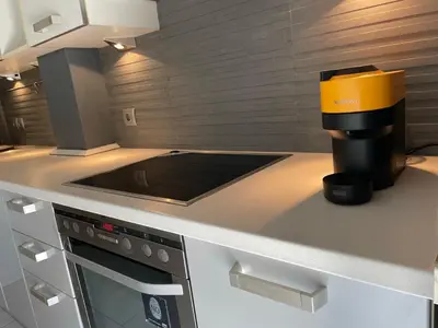 a coffee maker on a counter in a kitchen at Cityspace Apartment, Athens in Athens