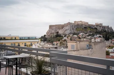 a view of the acropolis from the balcony of a building at Acropolis Luxury Penthouses with Majestic Views in Athens