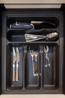 a black drawer with utensils in it at Lux Residence Near Acropolis VIPGreece in Athens