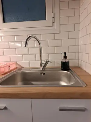 a stainless steel sink in a kitchen at Νέο στούντιο, Νέος Κόσμος in Athens