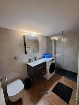 a bathroom with a toilet and a sink and a shower at Νέο στούντιο, Νέος Κόσμος in Athens