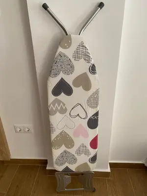 a vase with a pattern on it is leaning against a wall at Le musée in Athens