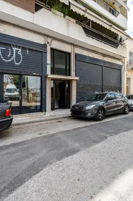 a car parked in front of a store front at Live like an Athenian! in Athens