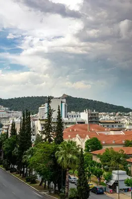 a view of a city with trees and buildings at Green Oasis in the center of Athens in Athens