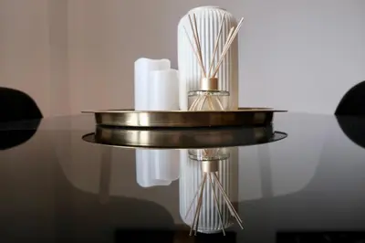 a table with a candle on top of it at SynPiraeus Apartments & Studios in Piraeus
