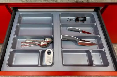 a metal drawer with some utensils in it at Bright Apartment In The Center VIPGreece in Athens