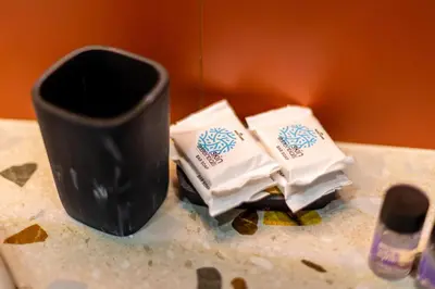 a black cup sitting on top of a counter at Bright Apartment In The Center VIPGreece in Athens