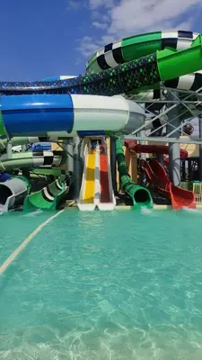 a group of water slides on a water park at Urbi Garden in Artemida