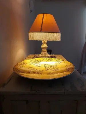 a lamp sitting on top of a table at Retro Stay Athens in Athens
