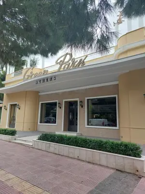 a building with a sign that reads delta hotel at Retro Stay Athens in Athens