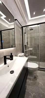 a bathroom with a sink and a toilet and a mirror at LView Zeus Temple in Athens