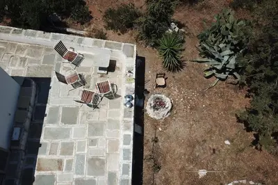 an overhead view of a garden with chairs and plants at Aegean traditional home in Athens Riviera in Sounio